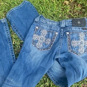 Embellished cross miss me jeans
